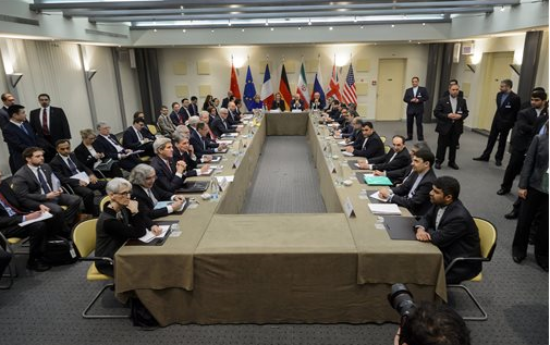 Officials of Britain, Russia, China, France, Germany, European Union, the United States and Iran wait for the start of a meeting on Iran's nuclear program at the Beau Rivage Palace Hotel in Lausanne, Switzerland Monday, March 30, 2015. Negotiations are entering a critical phase with differences still remaining just two days before a deadline for the outline of an agreement. (AP Photo/Brendan Smialowski, Pool) 