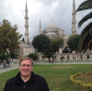 Standing in front of the famed Blue Mosque in Istanbul, Turkey.